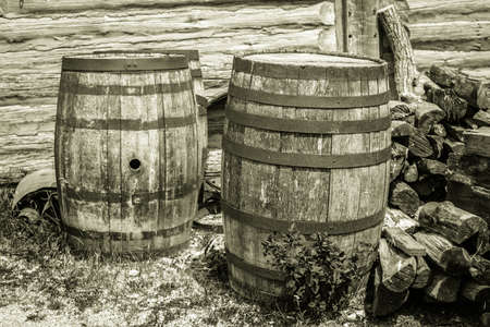 Vintage Water Barrels. Weathered and worn vintage water barrels in black and white.