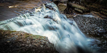 Over The Edge Of Canyon Falls. The precipice of Canyon Falls in Michigan's wild and beautiful Upper...