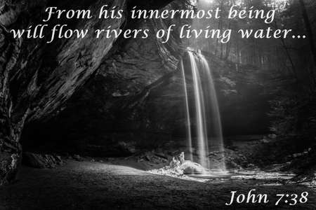Living Waters. Spring waterfall flows over a cliff with inspirational verse from the book of John.