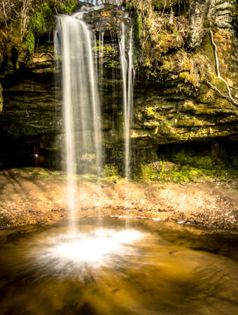 Michigan Upper Peninsula Waterfall.  Scott Falls is a seasonal waterfall located on the outskirts of Christmas, Michigan.の写真素材