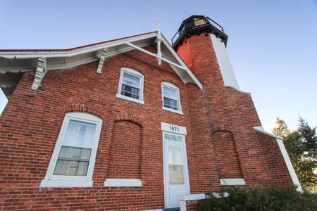 Eagle Harbor, Michigan, USA - July 21, 2016: Exterior of the Eagle Harbor Lighthouse on the shores of Lake Superior in Michigan's Keweenaw Peninsula.のeditorial素材