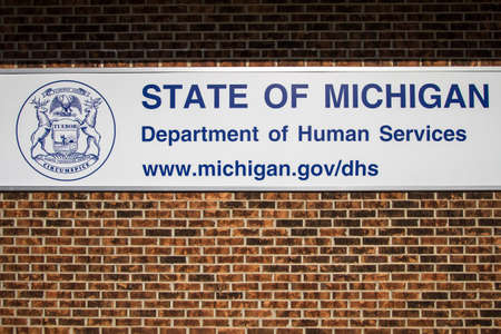 Sandusky, Michigan, USA - August 1,2016: Exterior banner for the department of Human Services for the state of Michigan.のeditorial素材