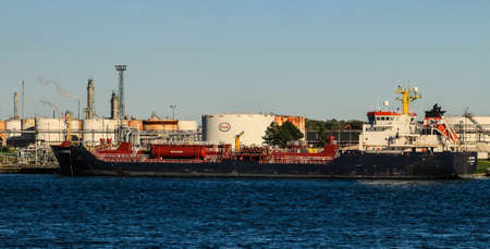 Sarnia, Ontario, Canada - September 12, 2016: The Great Lakes freighter Algonova at the Esso refinery in Sarnia, Ontario. Operating under Imperial Oil, it is the largest producer of petroleum products in Canada.のeditorial素材