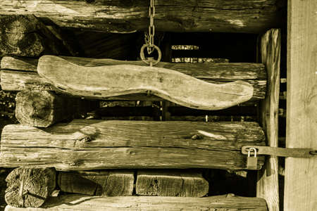 Traditional Wooden Yoke. Pioneer farm era wooden yoke and barn interior. This is a public building...