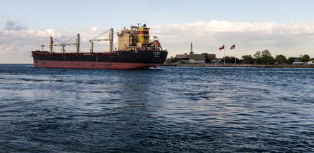 Port Huron, Michigan, USA - May 29, 2017: Great Lakes freighter Strandja upbound on the international waterway of the St. Clair River on the US and Canadian borderのeditorial素材