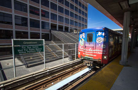 Detroit, Michigan, USA - March 28, 2018: The Detroit People Mover public transit system enters the...