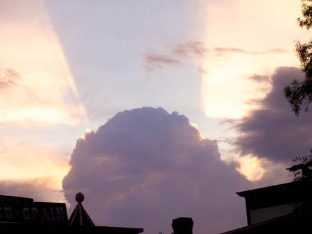 Large Cloud With Sun Rays の写真素材