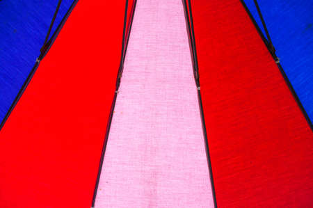 In the shade of an umbrella at Slateの写真素材