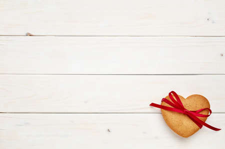 Ginger cookies on white wooden background