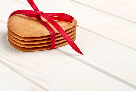 Ginger cookies on white wooden backgroundの写真素材