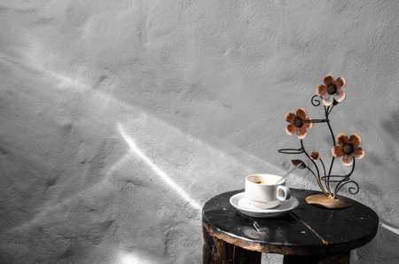 coffee cup with wood flowerの写真素材