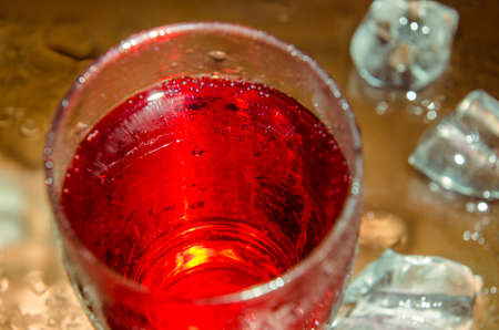 Abstract  red glass closeup with iceの写真素材