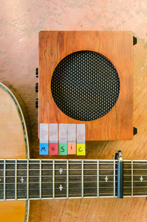 Music alphabet with acoustic guitar and amplifier closeupの写真素材