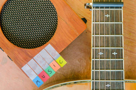 Music alphabet with acoustic guitar and amplifier closeupの写真素材