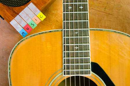 Music alphabet with acoustic guitar and amplifier closeupの写真素材