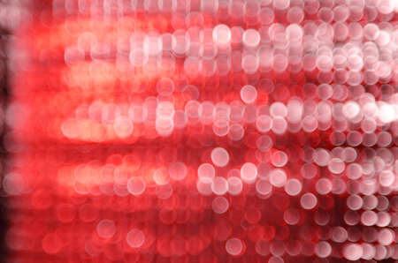 Red and white blur bokehの写真素材