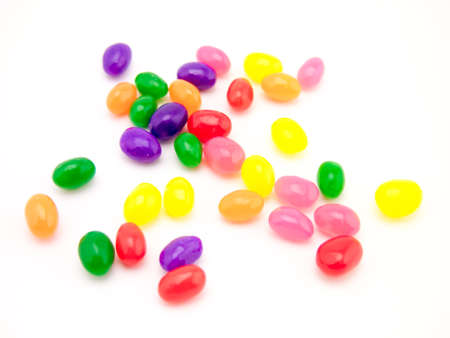 Cute colorful jelly beans on white background.の写真素材