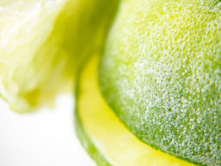 Frozen lime with ice in summer and start melting.の写真素材