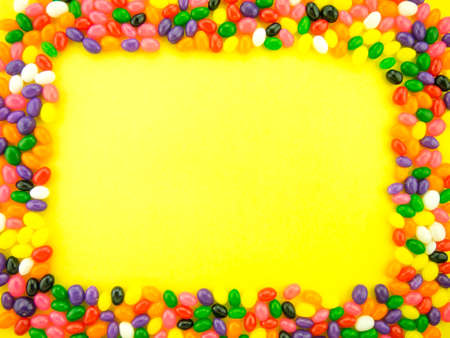 Frame and background made of colorful jelly beans.の写真素材
