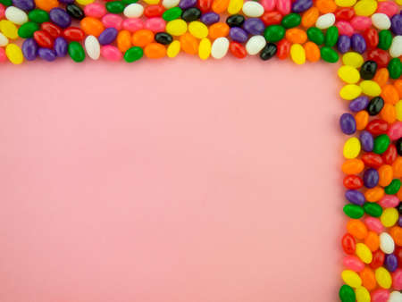 Frame and background made of colorful jelly beans.の写真素材