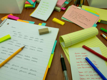 Writing new words again and again to learn new language.の写真素材