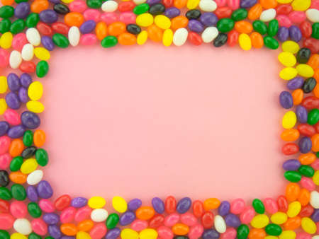 Frame and background made of colorful jelly beans.の写真素材