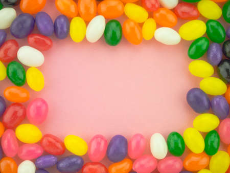 Frame and background made of colorful jelly beans.の写真素材