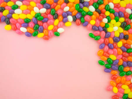 Frame and background made of colorful jelly beans.の写真素材