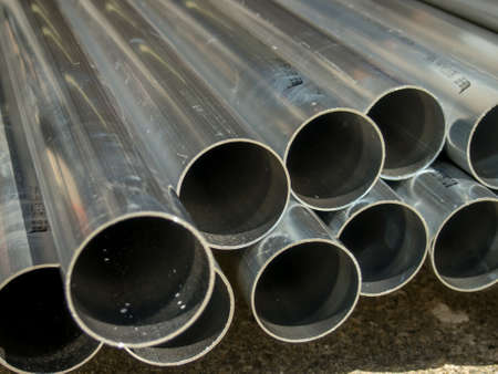 Stack of Many Pipes at the Construction Siteの写真素材