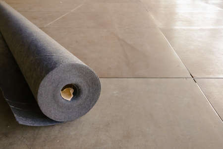 The Roll of Black Carpet at the Constructionsiteの写真素材