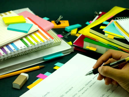 Learning New Language Writing Words Many Times on the Notebook; Spanishの写真素材
