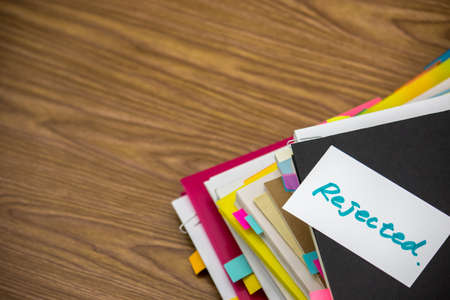 Rejected; The Pile of Business Documents on the Deskの写真素材