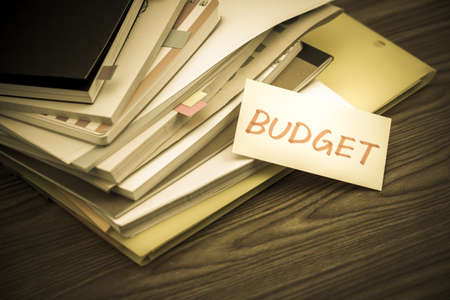 Budget; The Pile of Business Documents on the Deskの写真素材