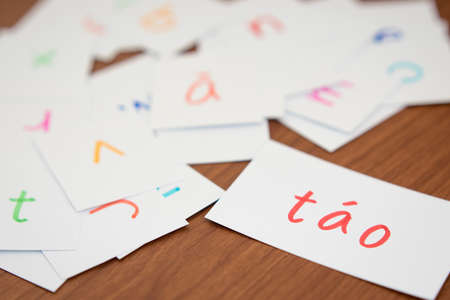 Vietnamese; Learning the New Word with the Alphabet Cards (Translation; Apple)の写真素材