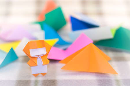The Little Ninja Kid are Teaching How to Play Origamiの写真素材