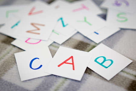 English; Learning the New Word with the Alphabet Cardsの写真素材