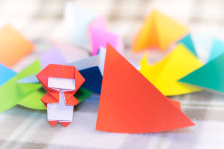 The Little Ninja Kid are Teaching How to Play Origamiの写真素材