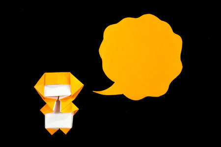 The Handmade Origami Balloons with Ninja Kid on the Black Backgroundの写真素材