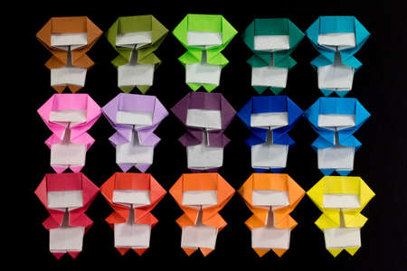 The Handmade Origami Ninja Kids on the Black Backgroundの写真素材