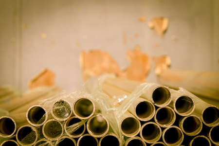 Stack of Many Pipes at the Construction Siteの写真素材