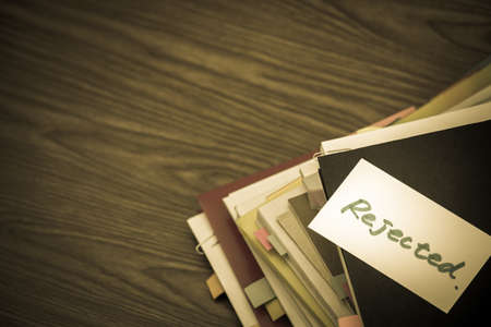 Rejected; The Pile of Business Documents on the Deskの写真素材