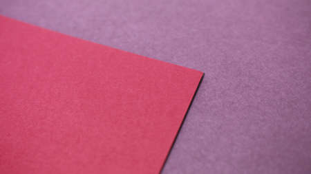 colorful color paper background. diagonal shape. vintage concept. retro concept. red and violetの写真素材