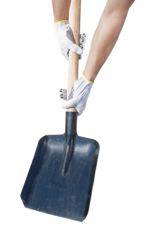 hands in gloves holding a shovel, isolated on white backgroundの写真素材