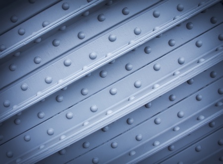 riveted metal from bridge, textural background