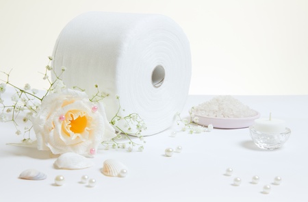 Toilet paper roll with rose, pearls and seashellsの写真素材