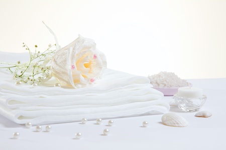 Spa accessories: white sheet and sea saltの写真素材