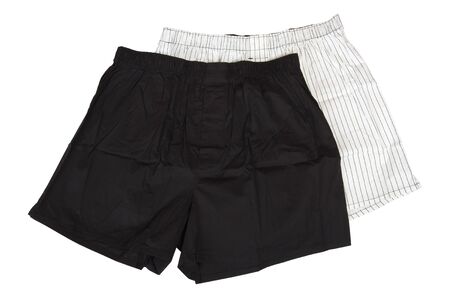 Two pairs of black and white boxer shorts isolated on white backgroundの写真素材