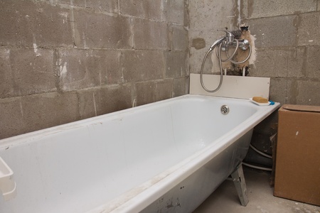 House under construction: bathroom installationの写真素材