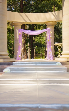 Luxury wedding gazebo with flowers in columnsの写真素材
