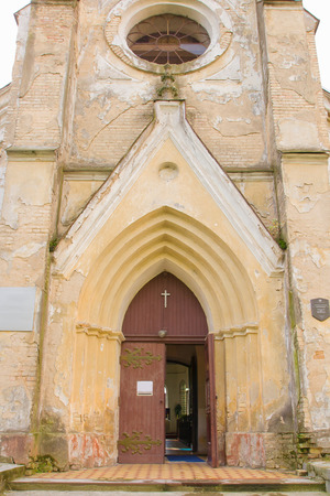 Old opened vintage door in church. Grodno, Belarusの写真素材